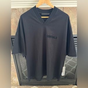 New With Tags Fear of God Essentials men’s black v-neck tee in size Medium